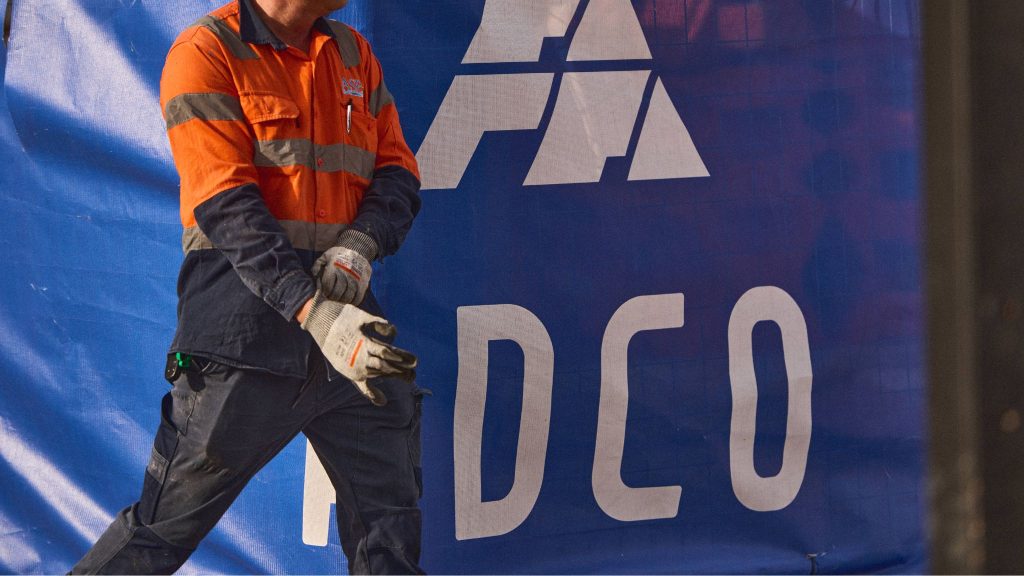 construction site banner mesh scrim and worker