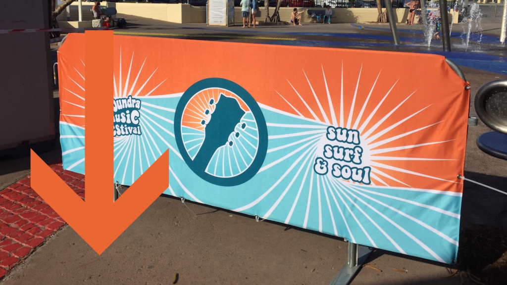 Music festival crowd control barrier signage