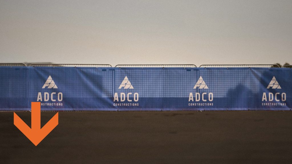 Winter weather banner mesh adco construction site